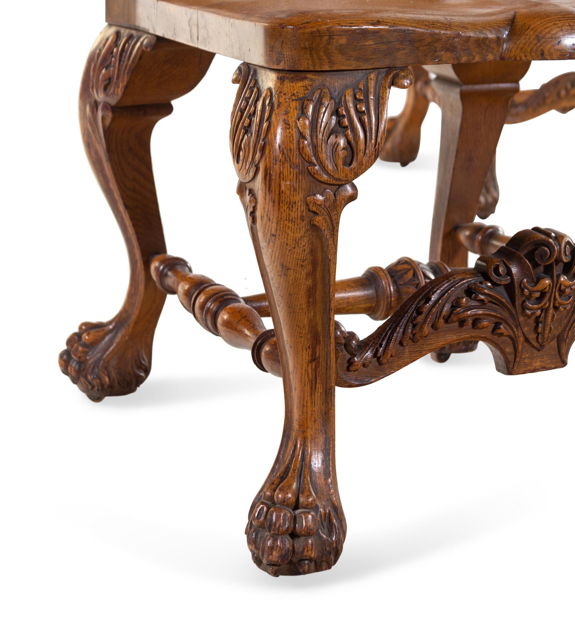 A Pair of Continental Renaissance Revival Carved Oak Side Chairs
