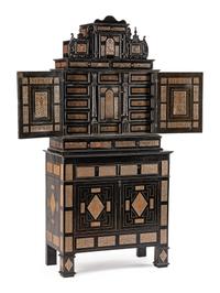 A Continental Pewter Inlaid and Ebonized Cabinet