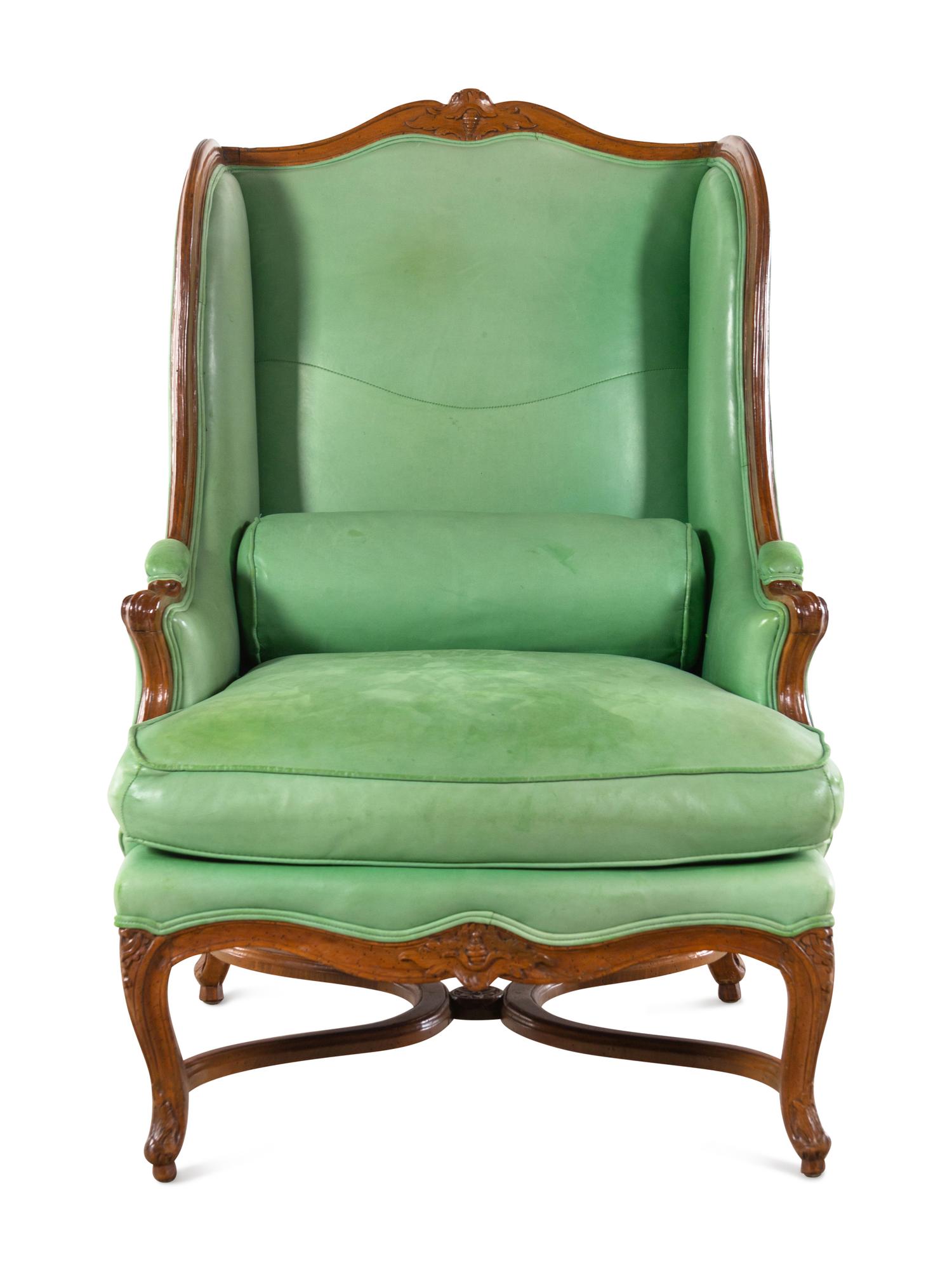 A Louis XV Leather-Upholstered Beechwood Bergère