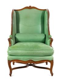 A Louis XV Leather-Upholstered Beechwood Bergère