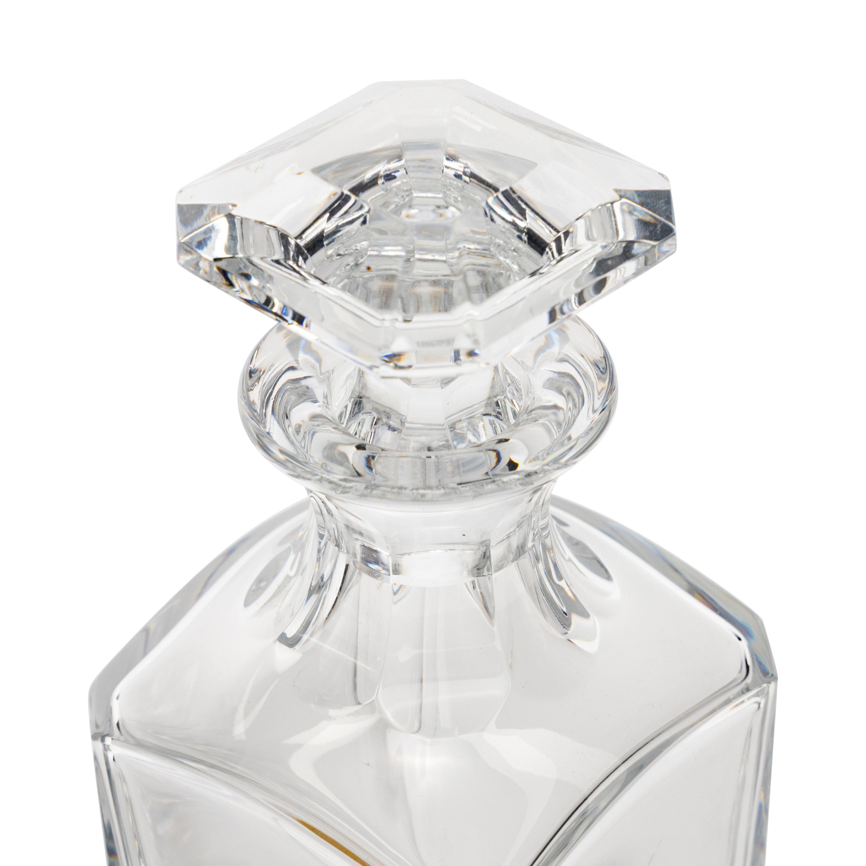 A Set of Baccarat Decanters and Snifters