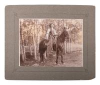 [WESTERN AMERICANA] -- [WILD WEST SHOWS]. Photographs and pinbacks featuring western performers.