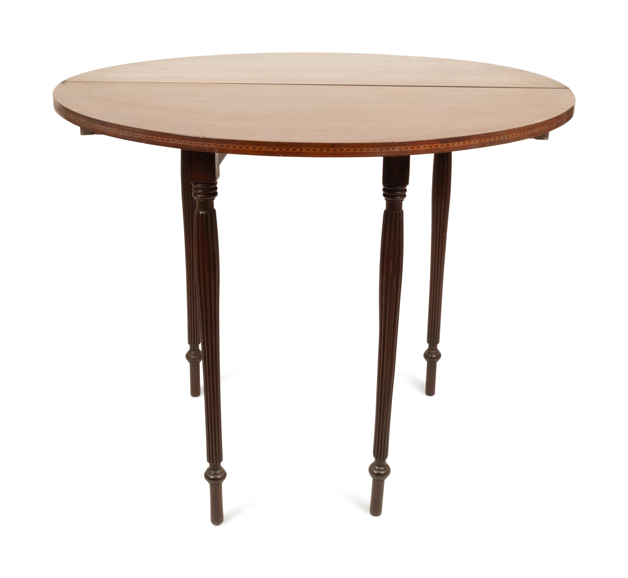 A Federal Style Mahogany and Marquetry Inlaid Game Table