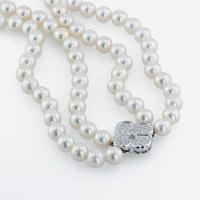 An 18K white gold, cultured pearl and diamond necklace, Mikimoto
