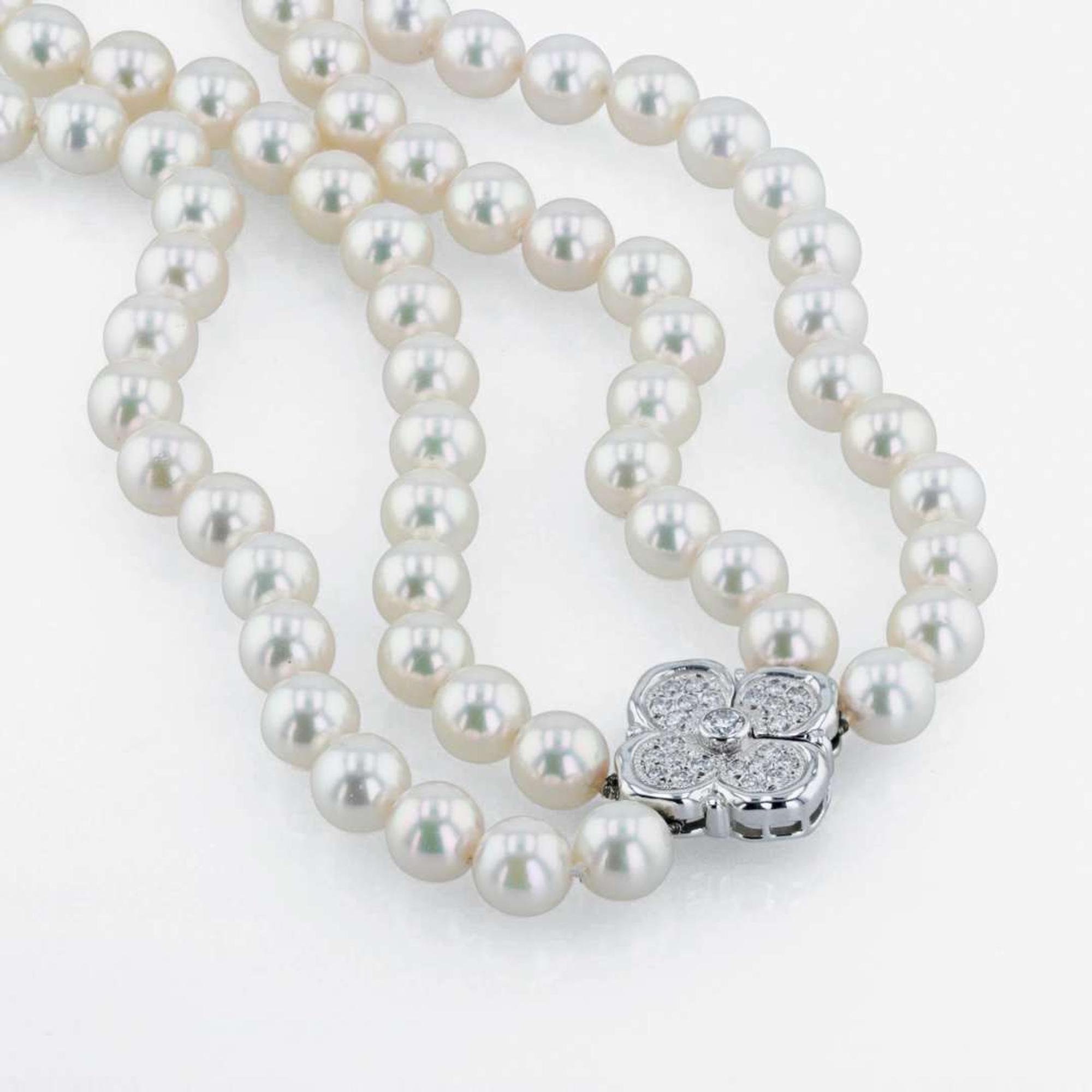 An 18K white gold, cultured pearl and diamond necklace, Mikimoto
