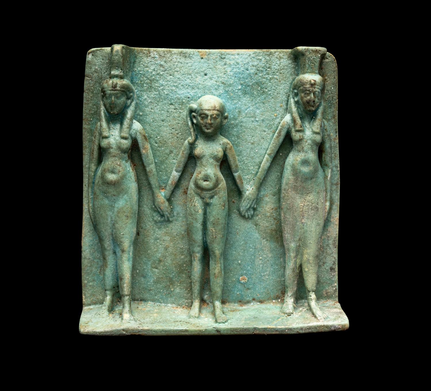 An Egyptian Faience Triad Amulet