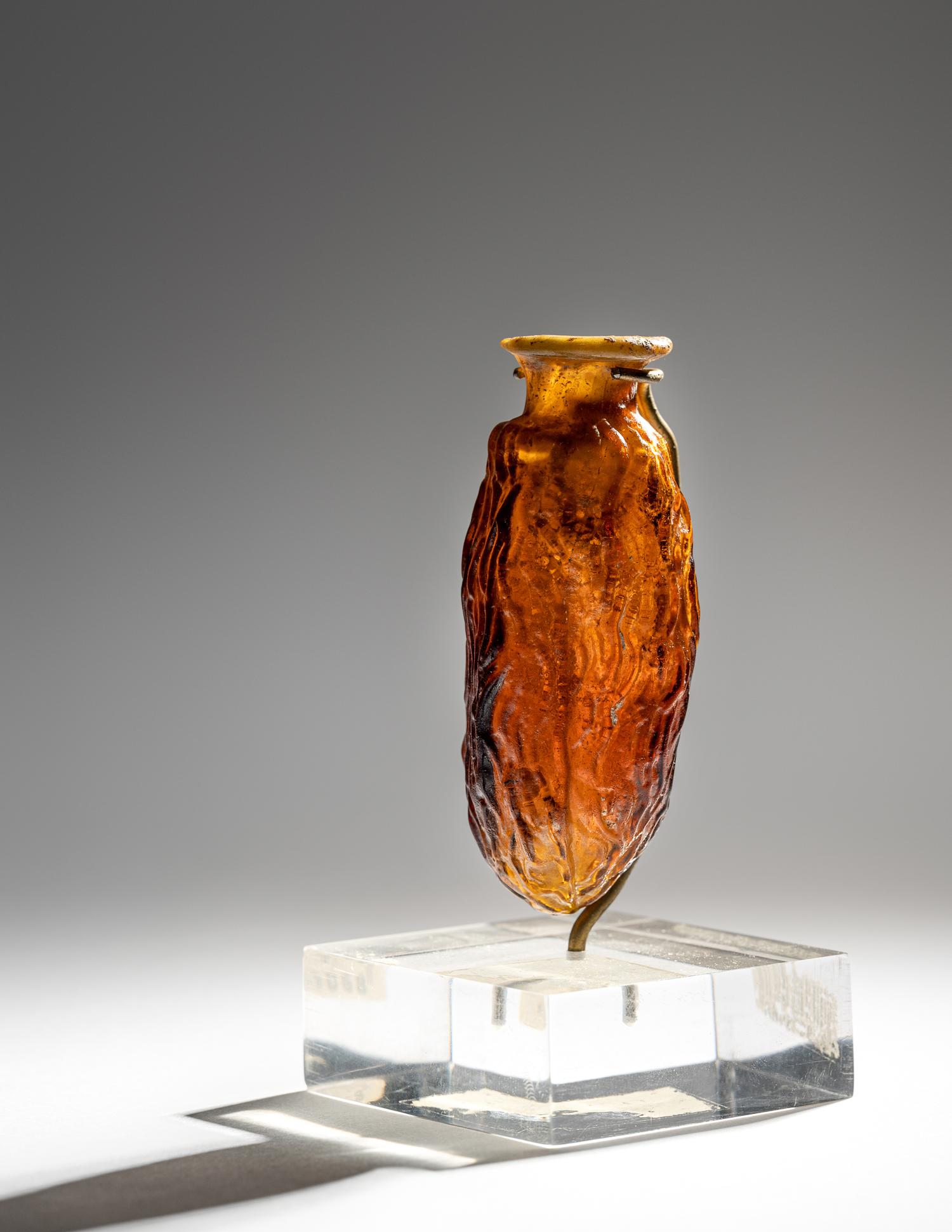 A Roman Amber Glass Date Flask