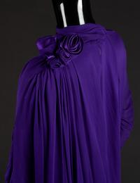 Dress, Earrings and Bag, 1987. Dress designed by Paul Zastupnevitch and made by Western Costume Company in Los Angeles — Worn by Olivia de Havilland at the Golden Globes Awards in 1987 to accept a Golden Globe Award for Best Supporting Actress in a Series, Mini Series or Motion Picture made for TV for her role in ‘Anastasia: The Mystery of Anna’.