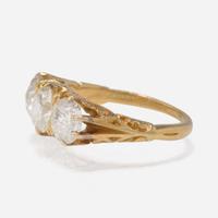 A Three-Stone Diamond and Yellow Gold Ring