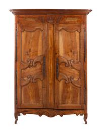 A French Provincial Walnut and Fruitwood Armoire