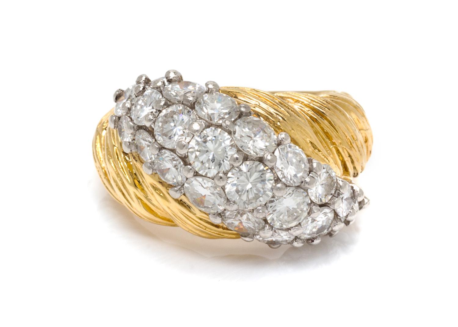 An 18 Karat Bicolor Gold and Diamond Ring, 8.10 dwts.