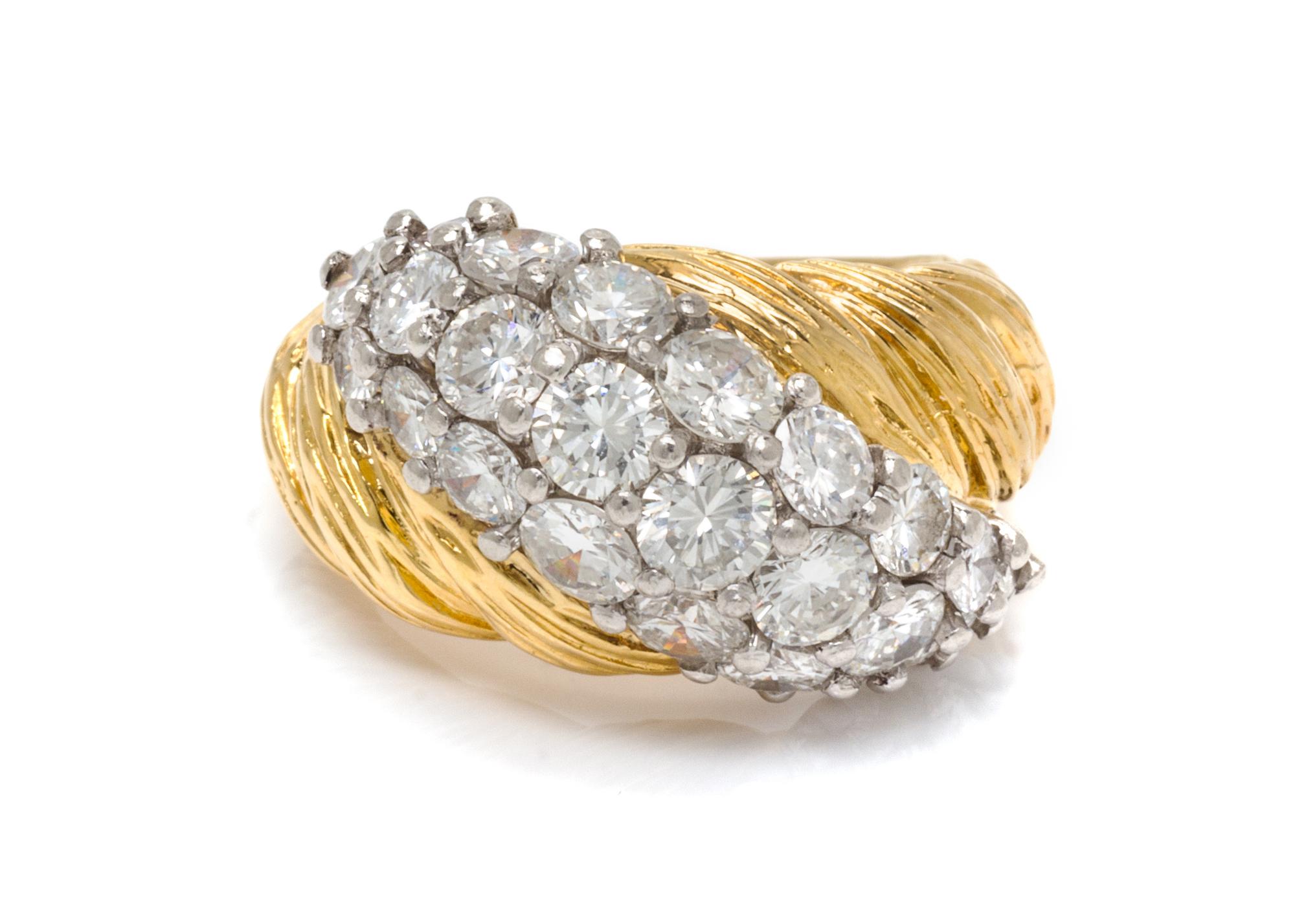An 18 Karat Bicolor Gold and Diamond Ring, 8.10 dwts.