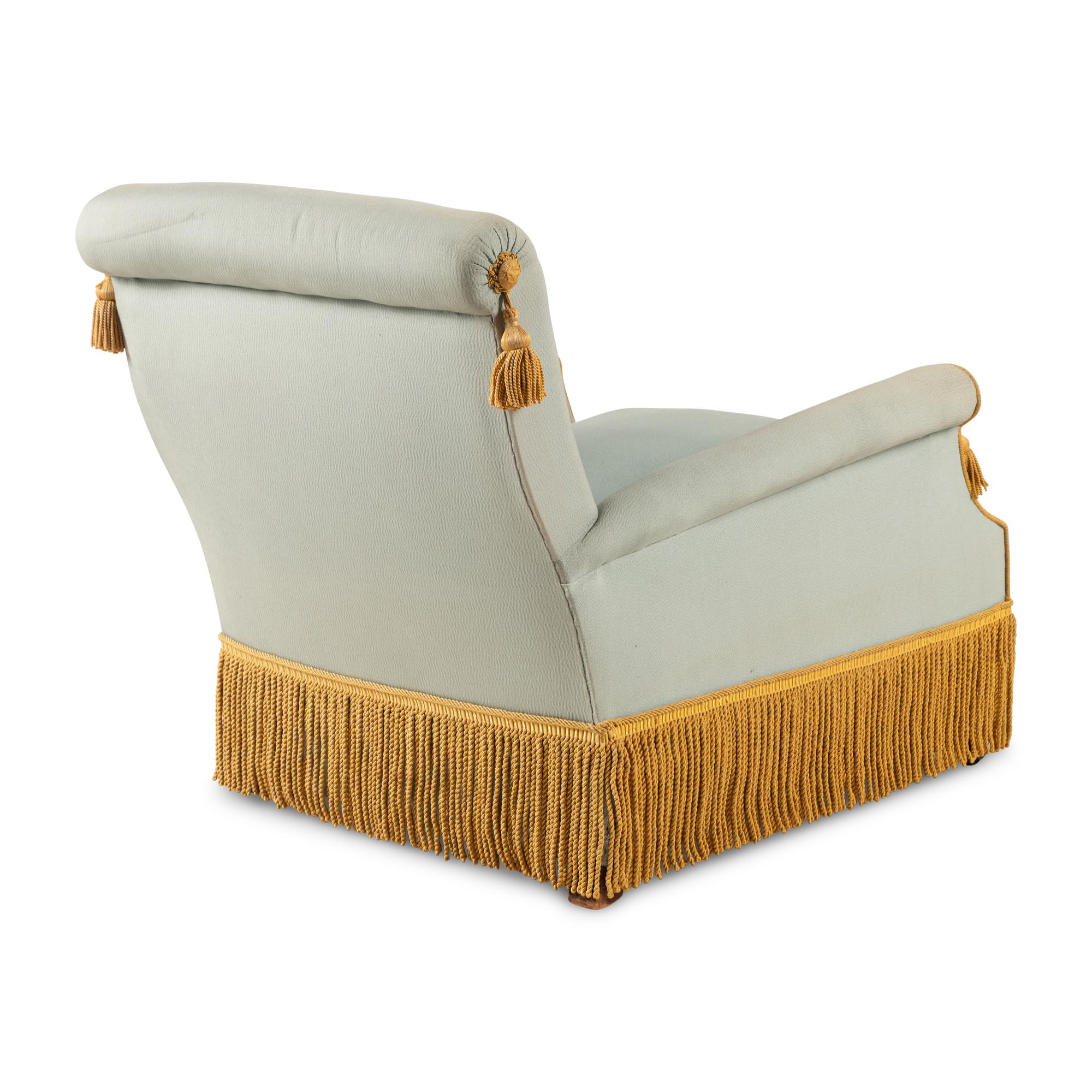 A Pair of Silk-Upholstered Easy Chairs with Buillon Fringe