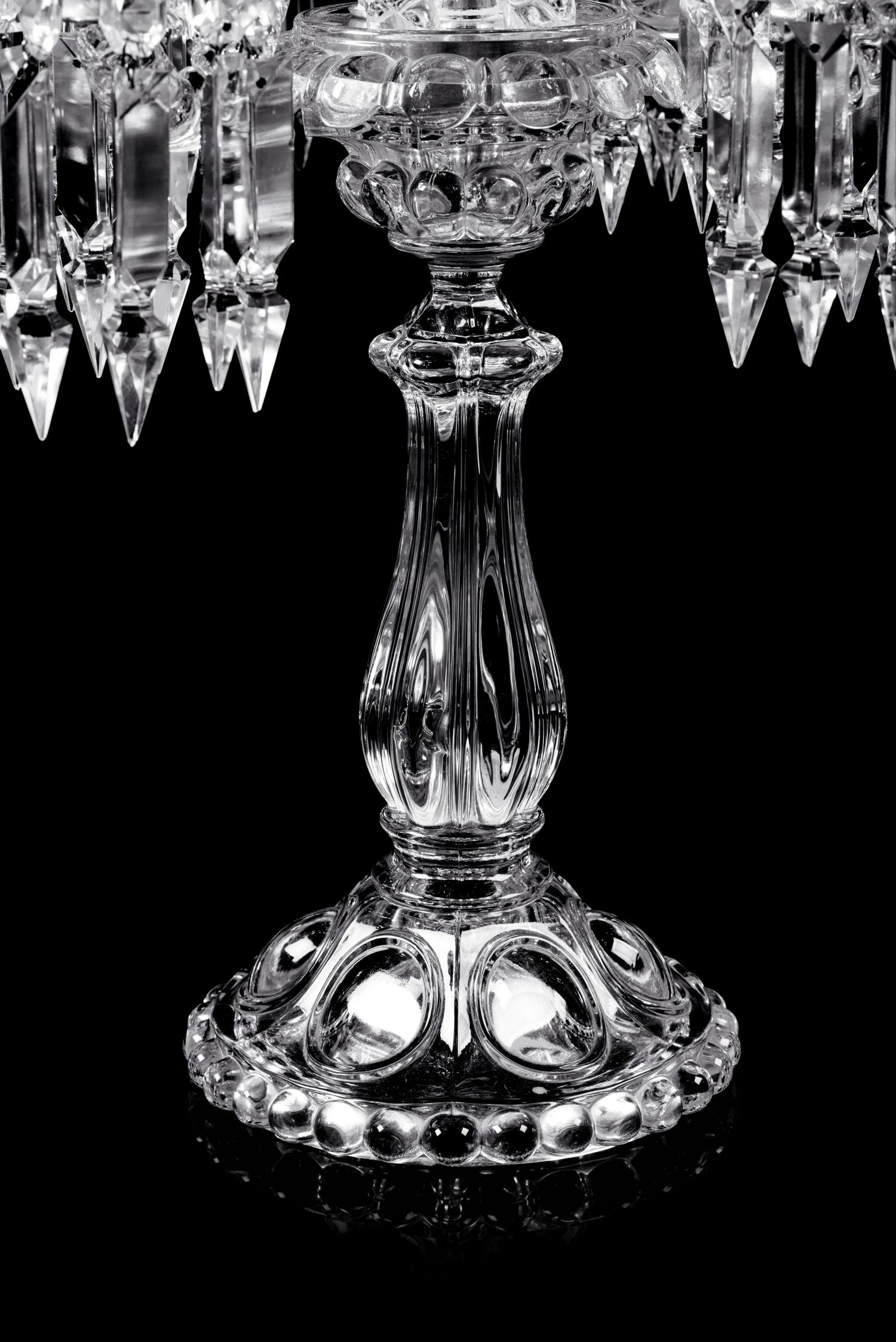 A Set of Three Baccarat Molded Glass Five-Light Candelabra