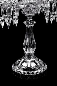 A Set of Three Baccarat Molded Glass Five-Light Candelabra