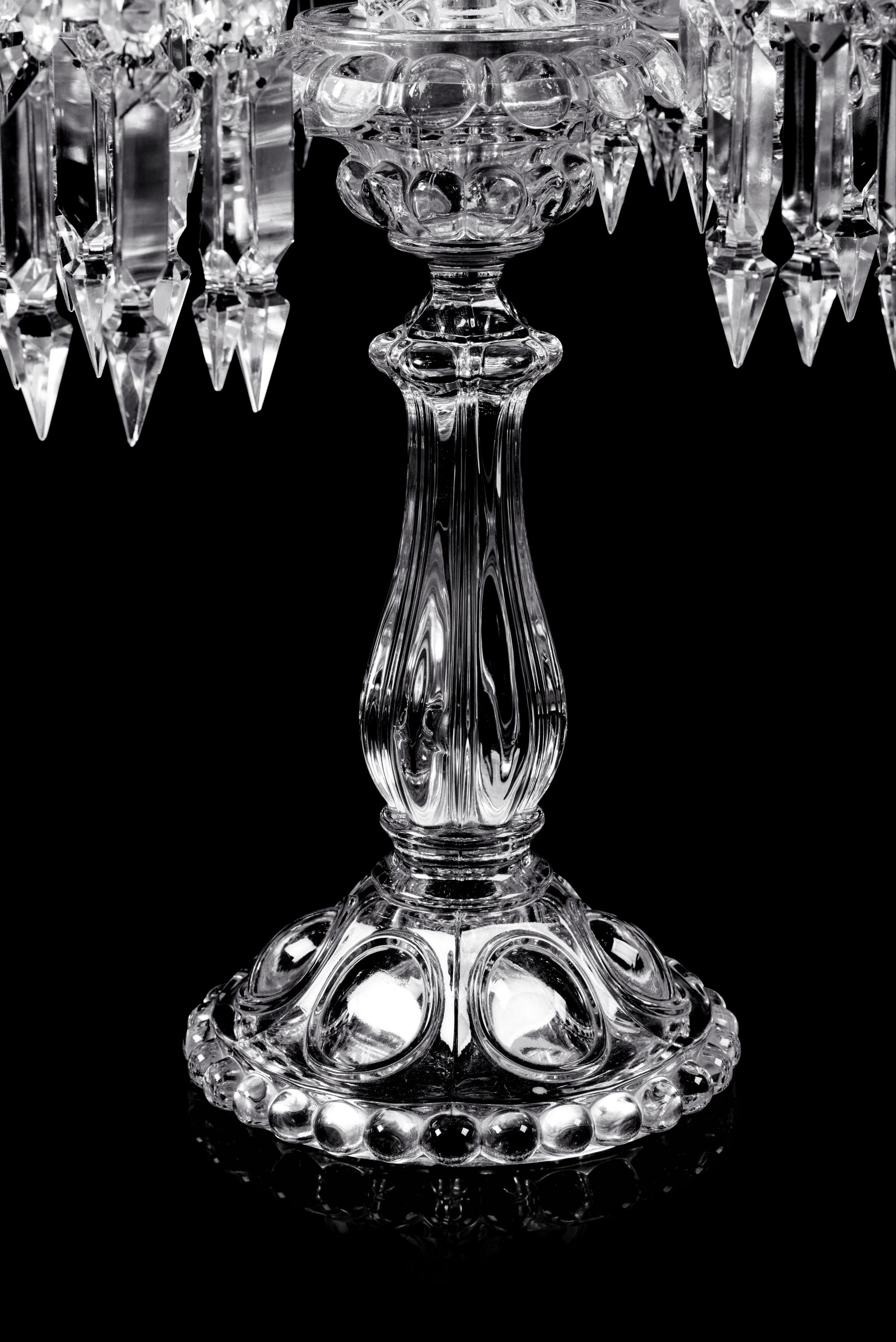 A Set of Three Baccarat Molded Glass Five-Light Candelabra