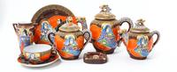 A Japanese Porcelain Tea Service Height of teapot 7 3/8 inches. — 20TH CENTURY