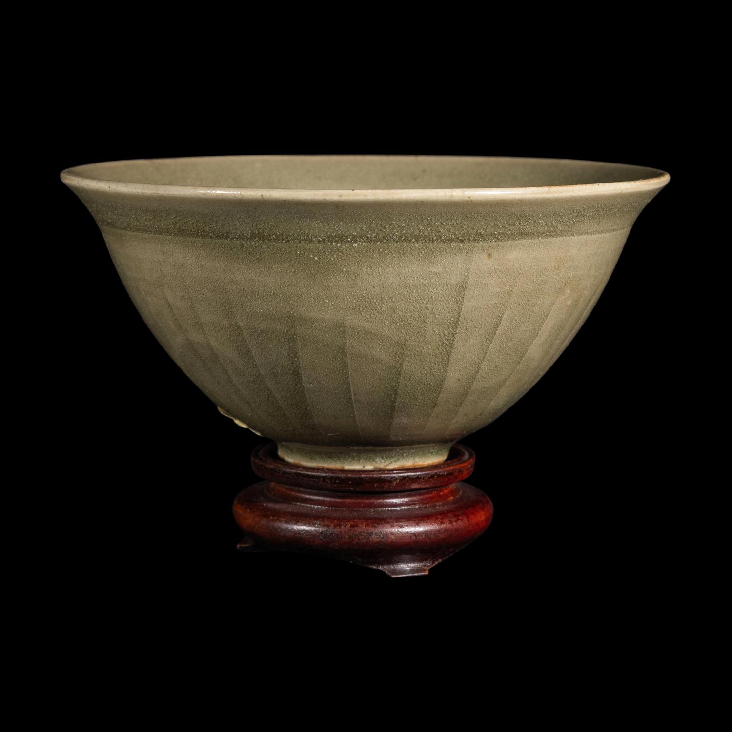 A Small Chinese Yaozhou-Style Celadon Glazed 'Dragon Fish' Bowl, Possibly Northern Song Dynasty 或為北宋 耀州窯模印雙魚碗