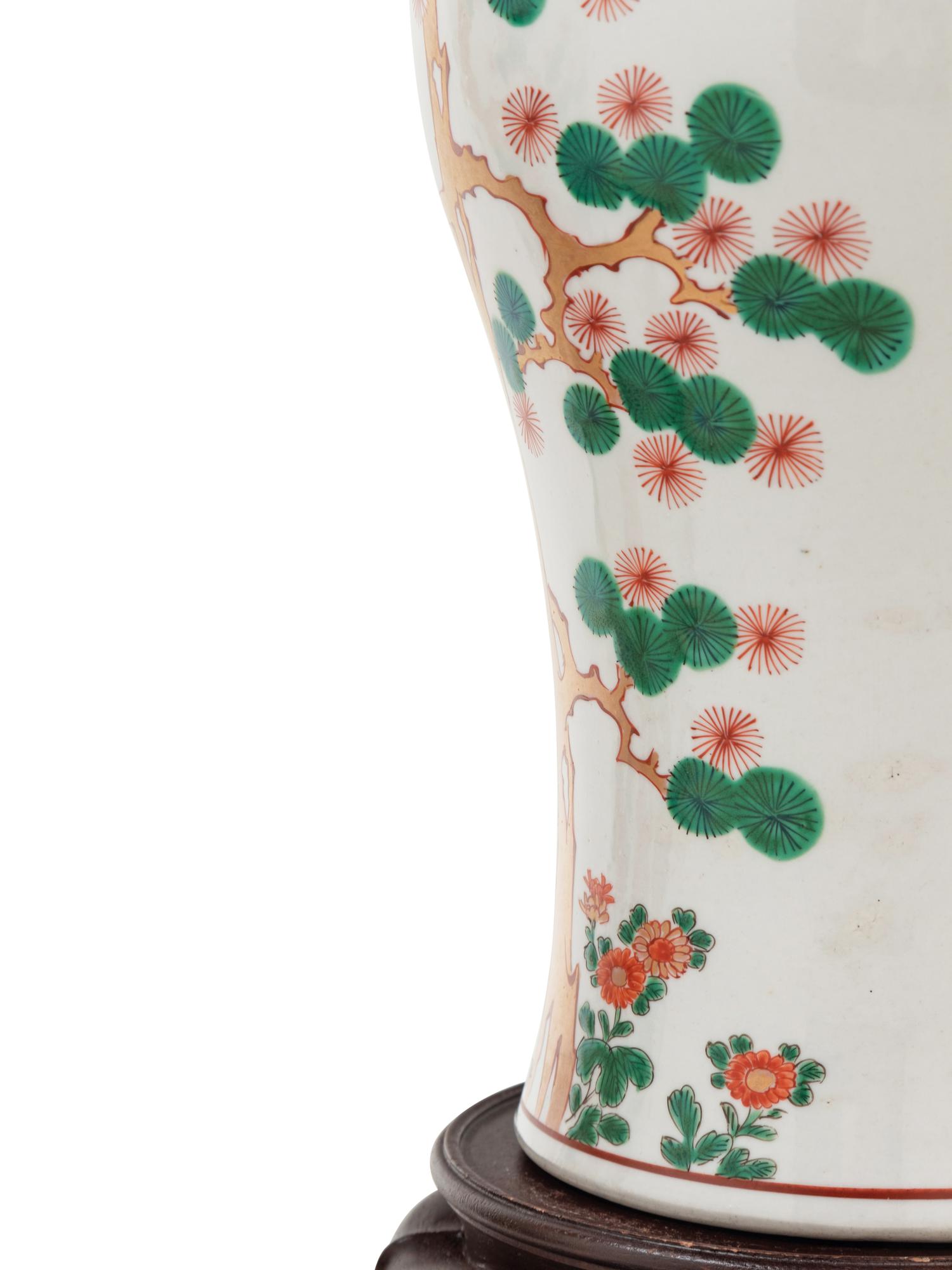 A Pair of Chinese Export Famille Rose Porcelain Covered Jars on Associated Stands