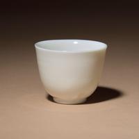 A Chinese Blanc-de-Chine Porcelain Cup and Associated Lotus Stand, 17th-18th Century — 清早中期 德化白瓷茶杯與蓮花盞托一套