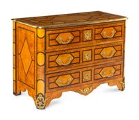 A Régence Style Gilt Metal Mounted Burl Walnut Chest of Drawers