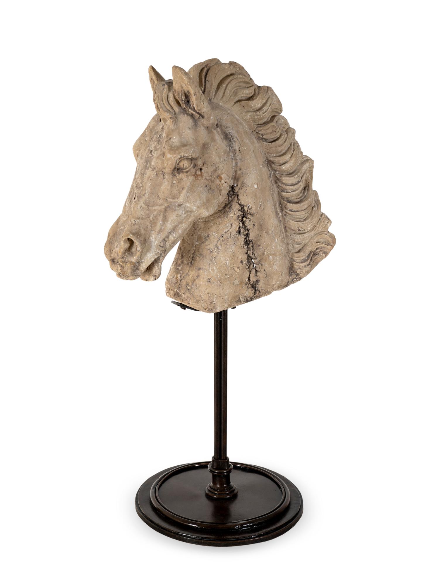 A Cast Stone Head of a Horse