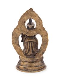 A Small Tibetan Gilt Bronze Figure of a Lama