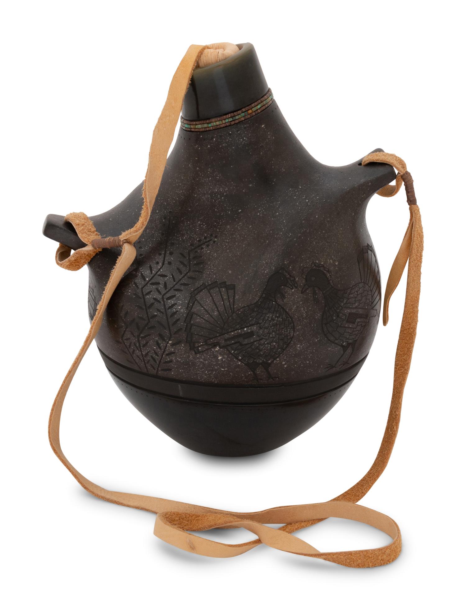 Micaceous Black and Sienna Pottery Canteen, with Sgraffito Decoration