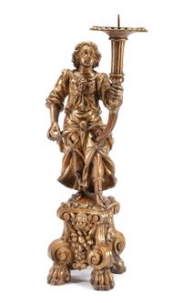 An Italian Carved Giltwood Figural Torchere Height 47 1/4 inches. — 18TH CENTURY