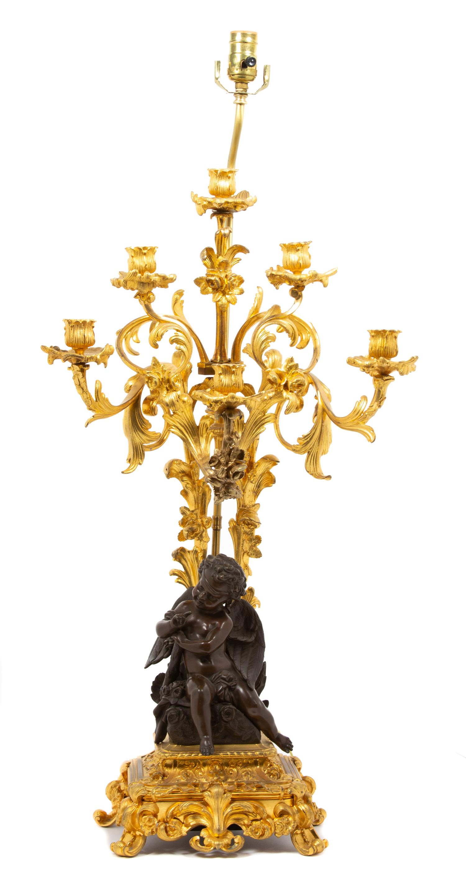 A Louis XV Style Gilt & Patinated Bronze Six-Light Candelabrum