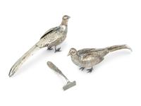 A Pair of German Silver Pheasant Form Casters
