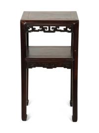 A Chinese Carved Hardwood Two-Tier Table