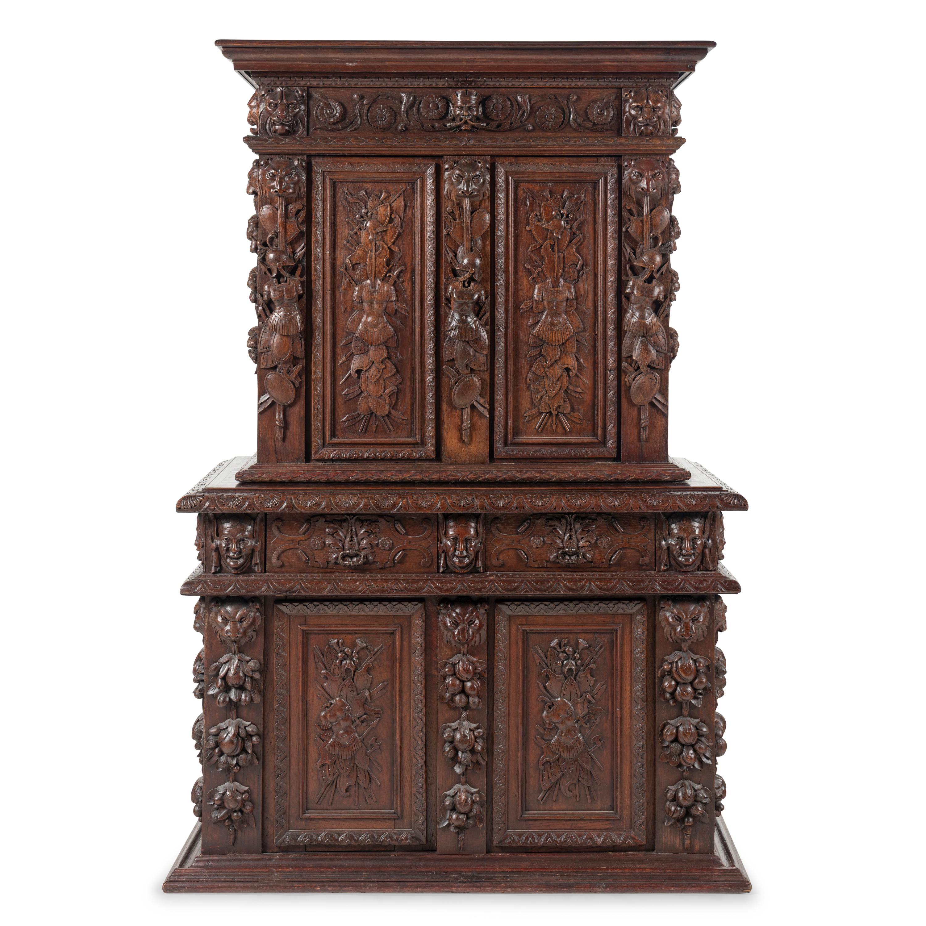 An Italian Renaissance Revival Carved Oak Cabinet