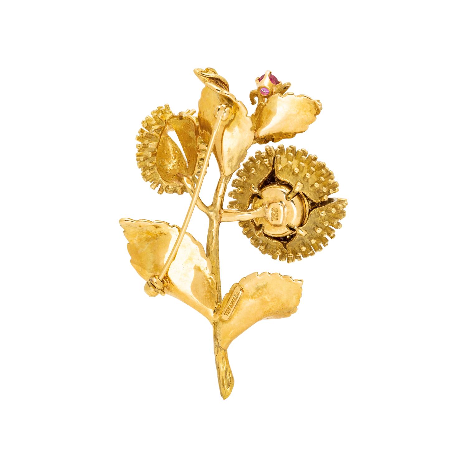 TIFFANY & CO., YELLOW GOLD, DIAMOND AND RUBY 'MOVING CHESTNUT' BROOCH