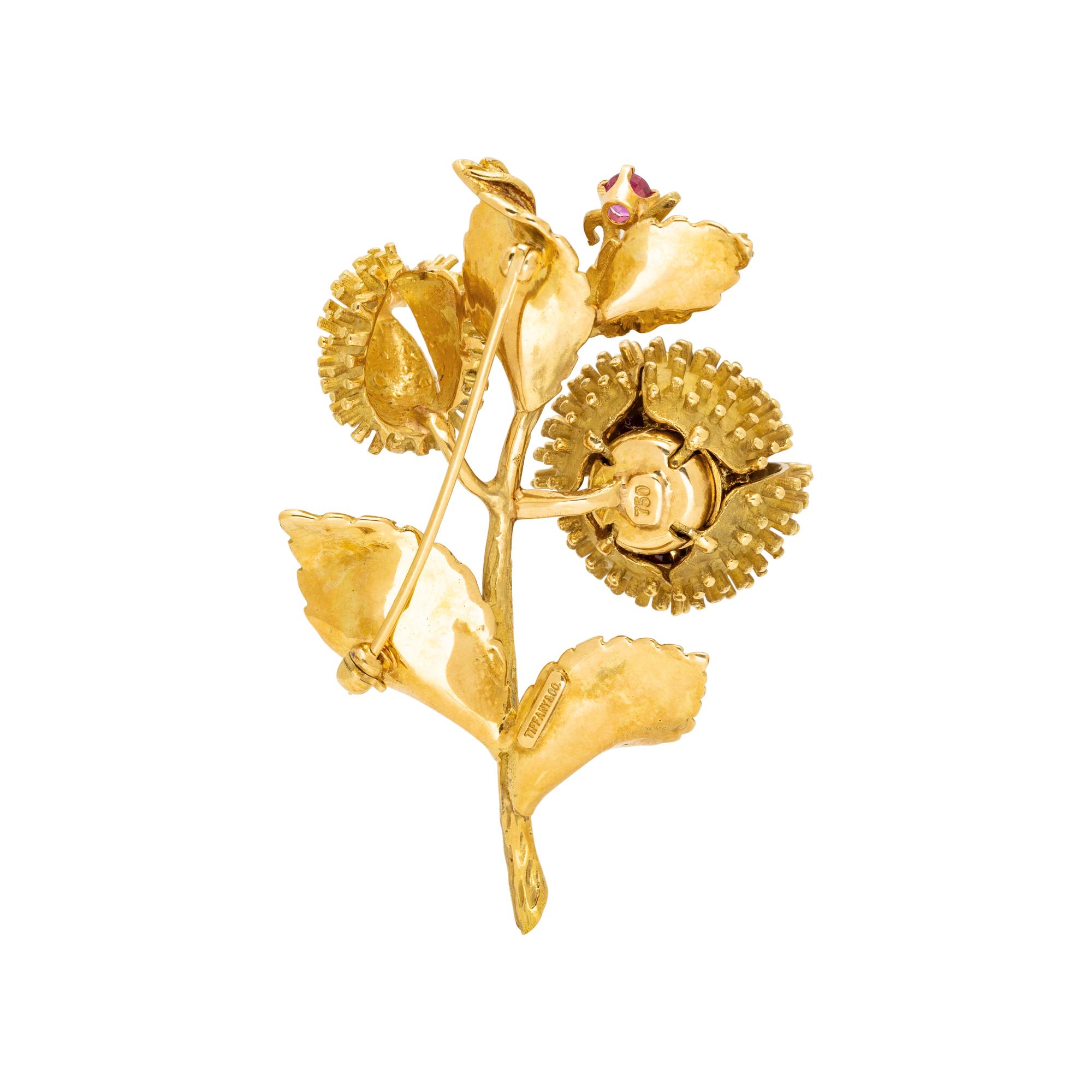 TIFFANY & CO., YELLOW GOLD, DIAMOND AND RUBY 'MOVING CHESTNUT' BROOCH
