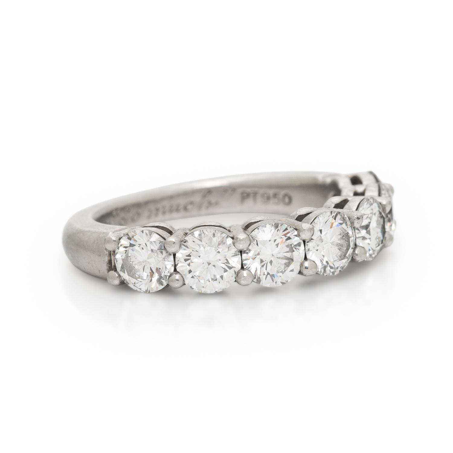 TIFFANY & CO., SEVEN DIAMOND AND PLATINUM RING