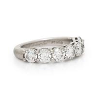 TIFFANY & CO., SEVEN DIAMOND AND PLATINUM RING