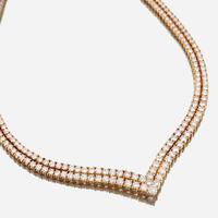 A diamond and eighteen karat gold necklace