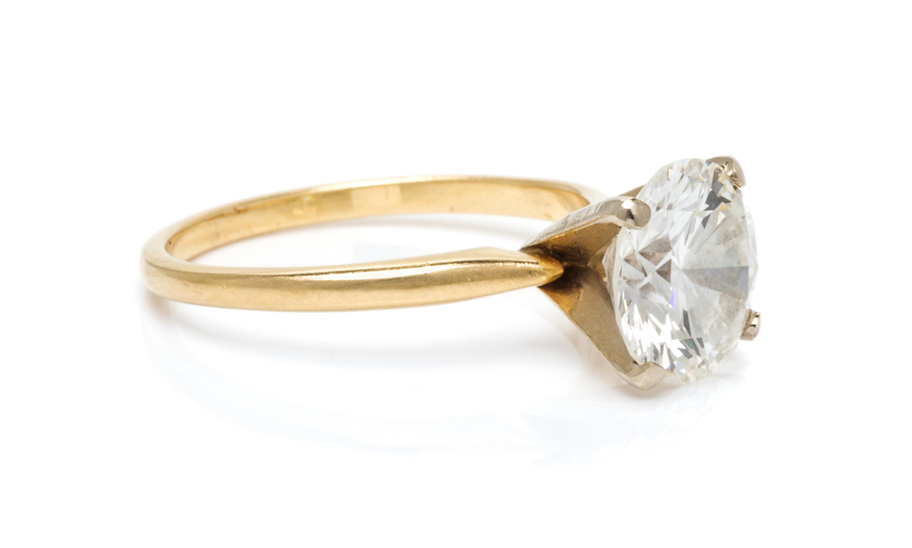 A Yellow Gold and Diamond Solitaire Ring, 1.50 dwts.