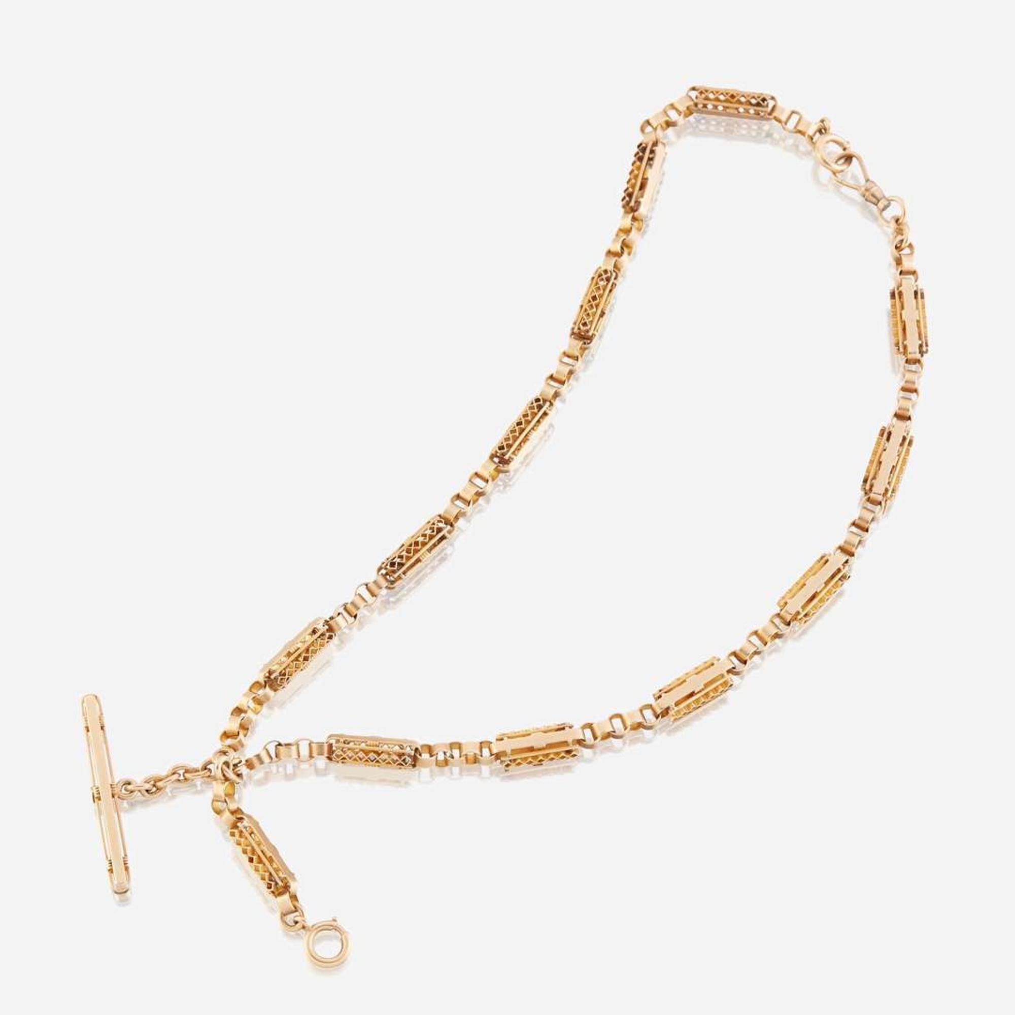 A fourteen karat gold watch chain