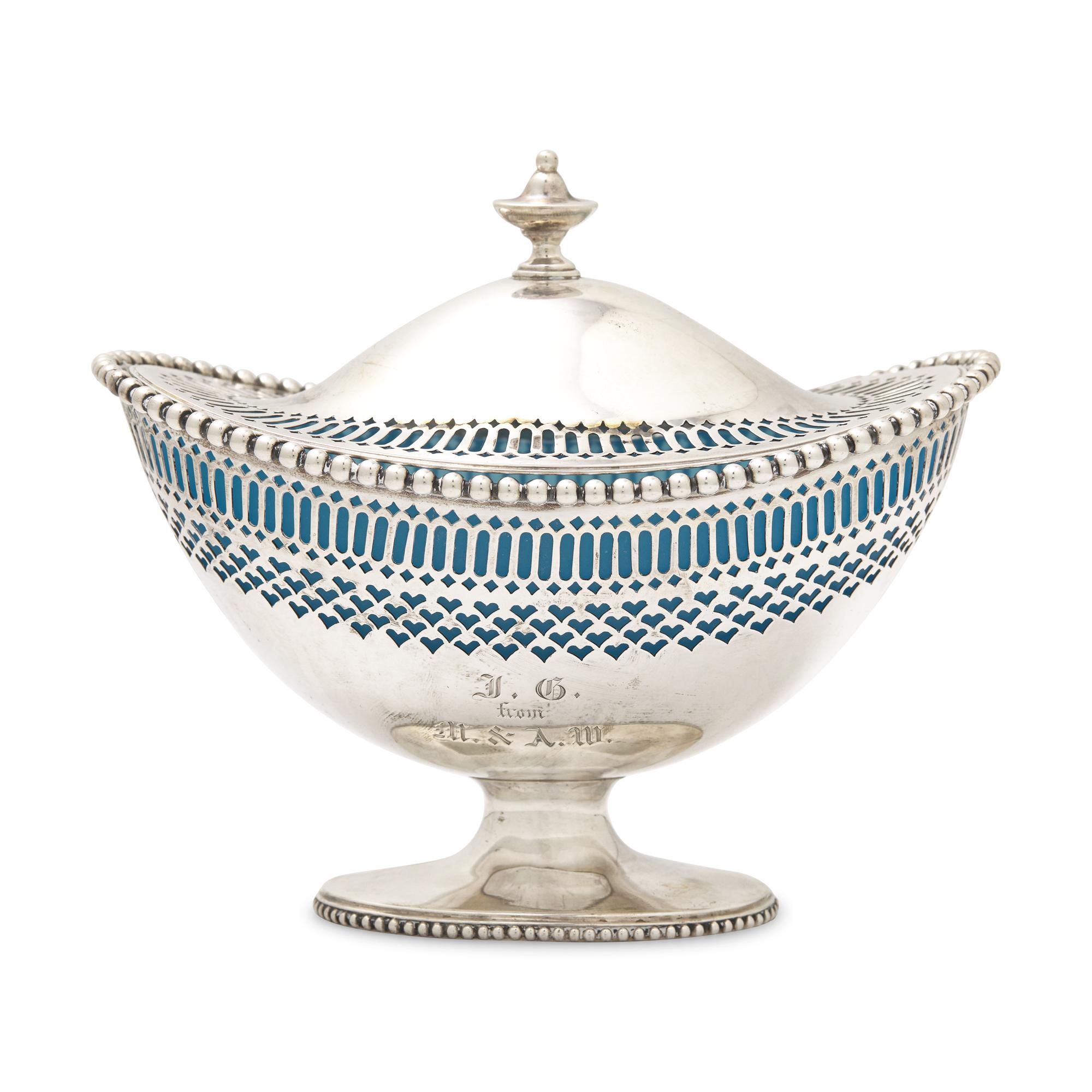 An Engraved and Pierced Coin Silver Glass-Lined Sugar Basket