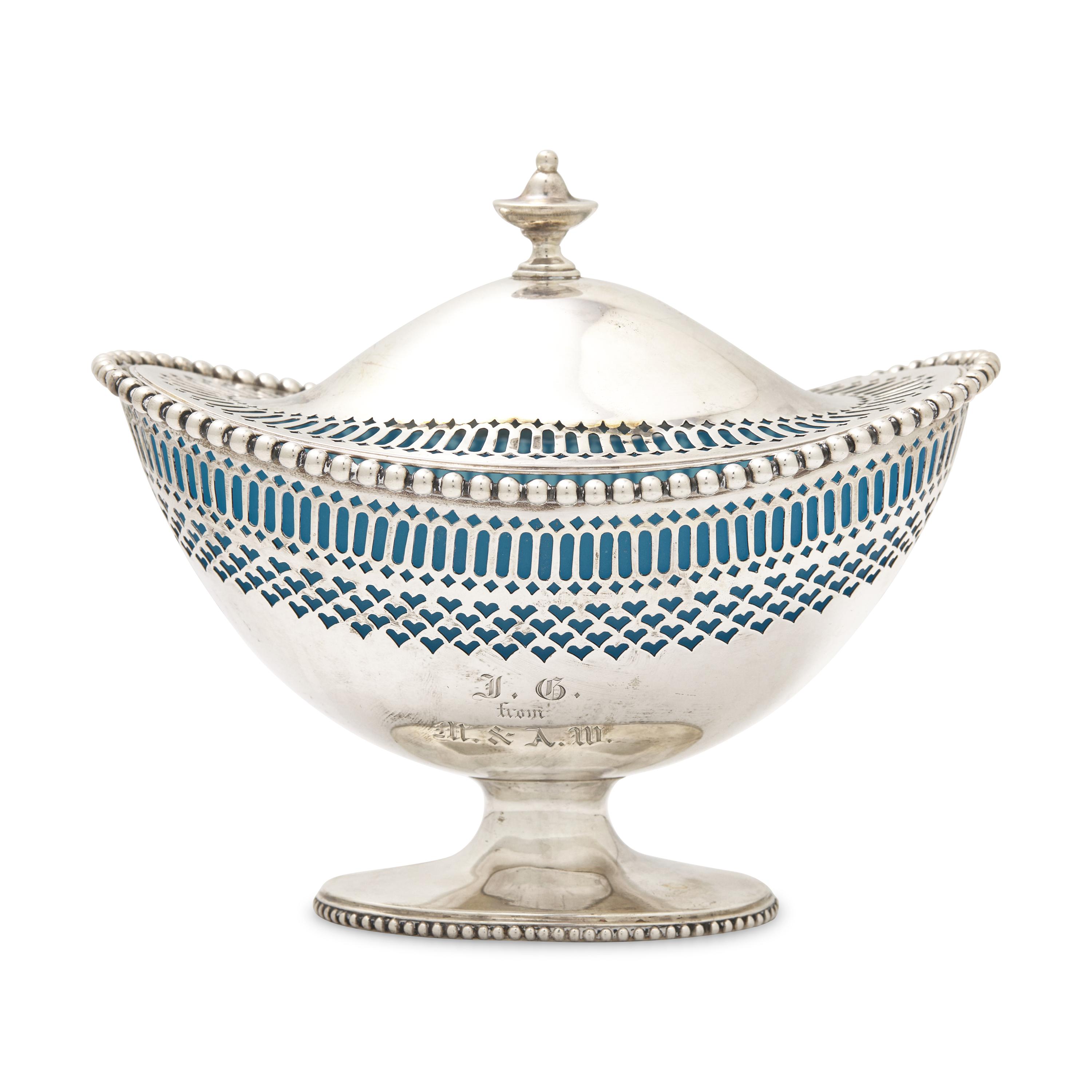An Engraved and Pierced Coin Silver Glass-Lined Sugar Basket