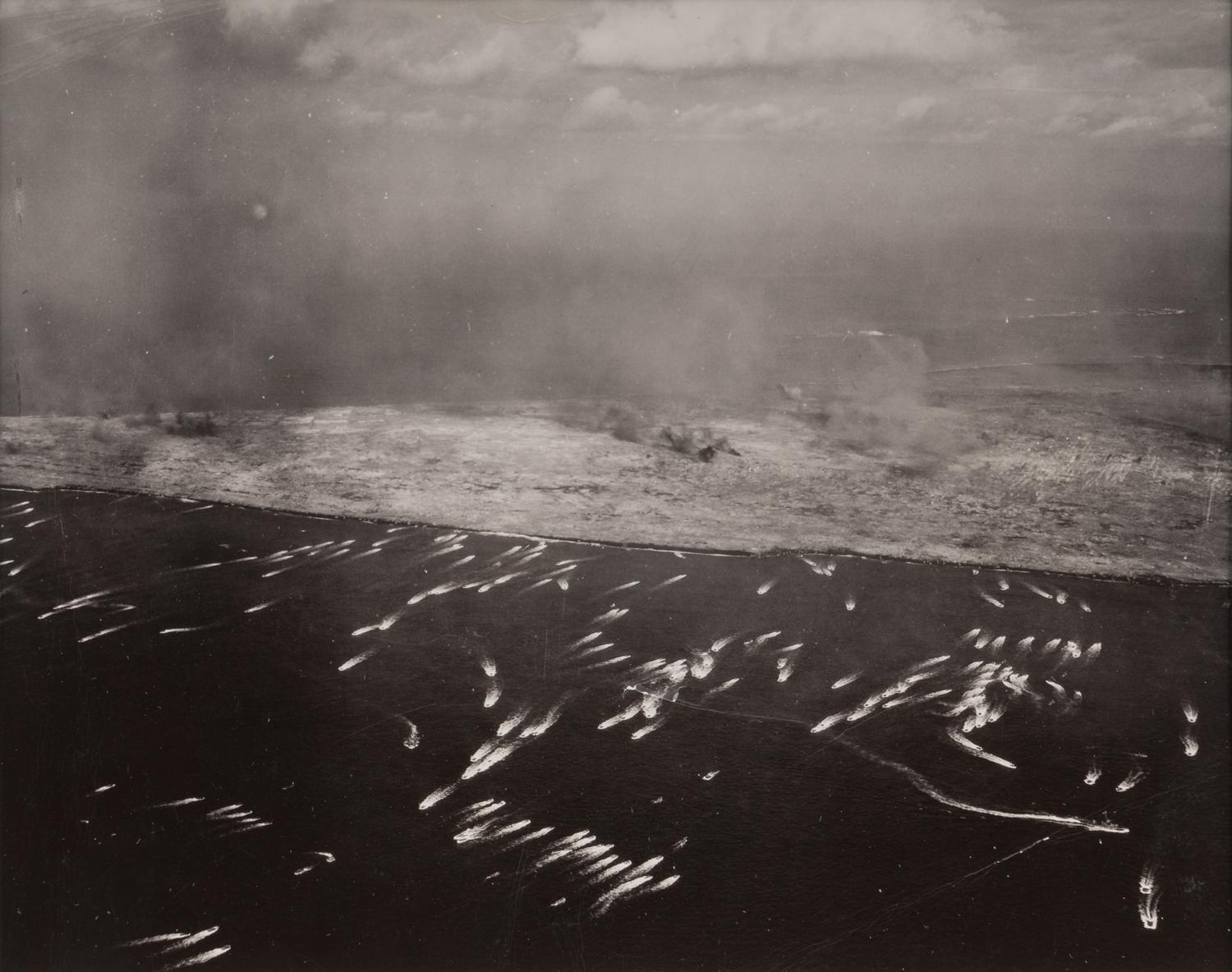 ROSENTHAL, Joe (1911-2006). Flag Raising on Mt. Suribachi, Iwo Jima. -- Aerial View of a Pacific Island. -- The 28th Regiment Atop Mt. Suribachi. -- Four Marines with Flag, Mr. Suribachi. 1945.