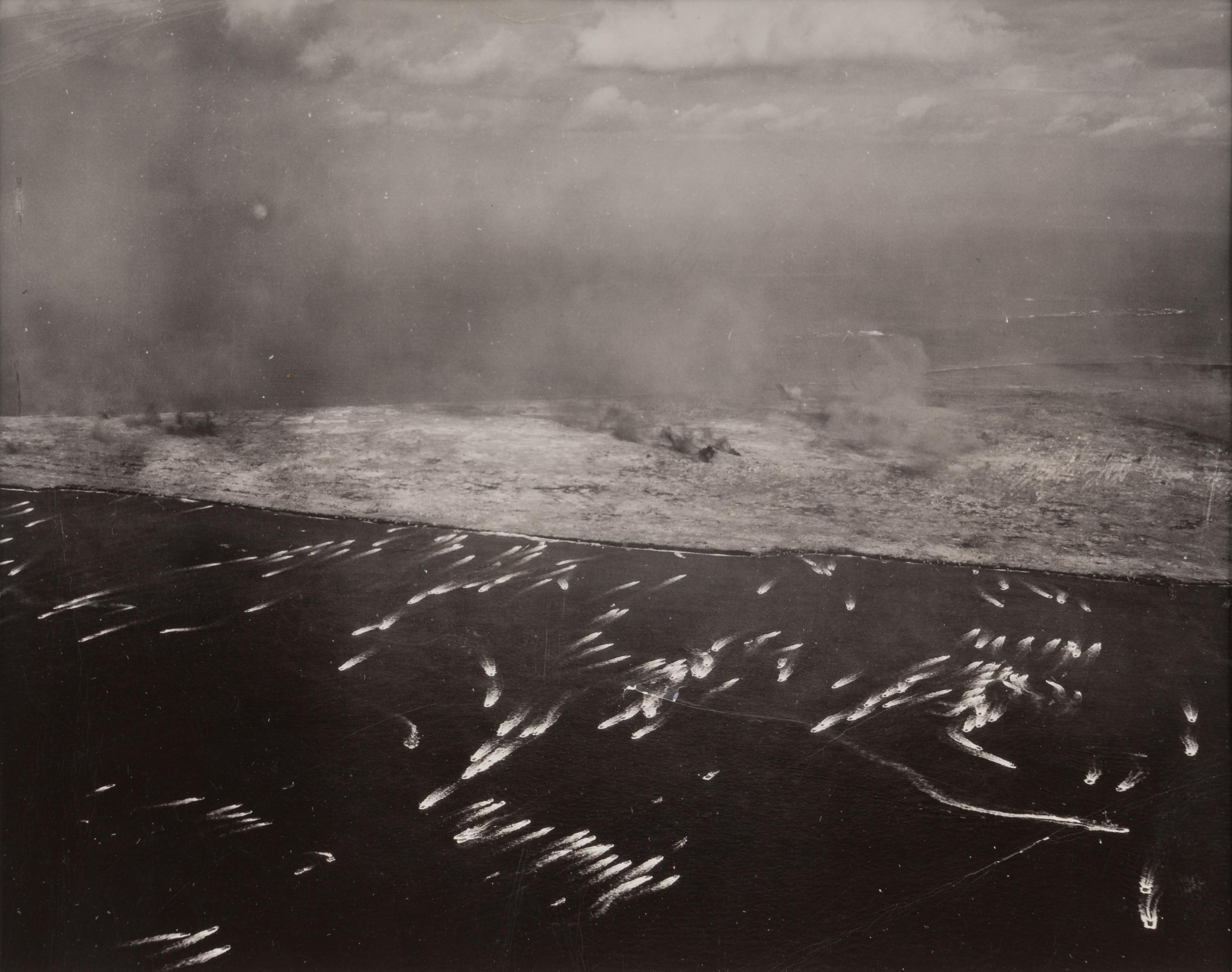 ROSENTHAL, Joe (1911-2006). Flag Raising on Mt. Suribachi, Iwo Jima. -- Aerial View of a Pacific Island. -- The 28th Regiment Atop Mt. Suribachi. -- Four Marines with Flag, Mr. Suribachi. 1945.