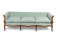 A French Provincial Louis XV Style Sofa — LATE 19TH CENTURY