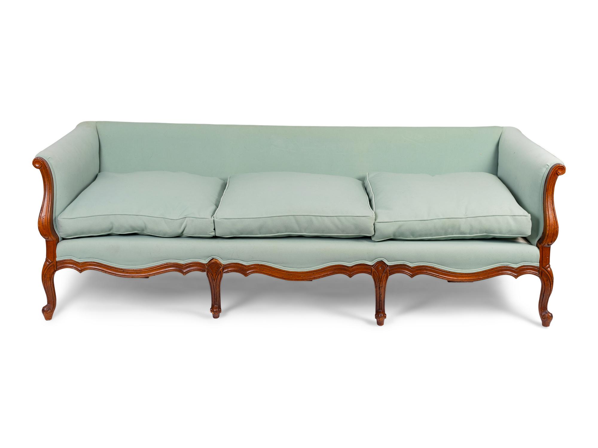 A French Provincial Louis XV Style Sofa — LATE 19TH CENTURY