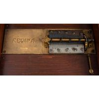 A Regina 15 1/2 Inch Disc Music Box