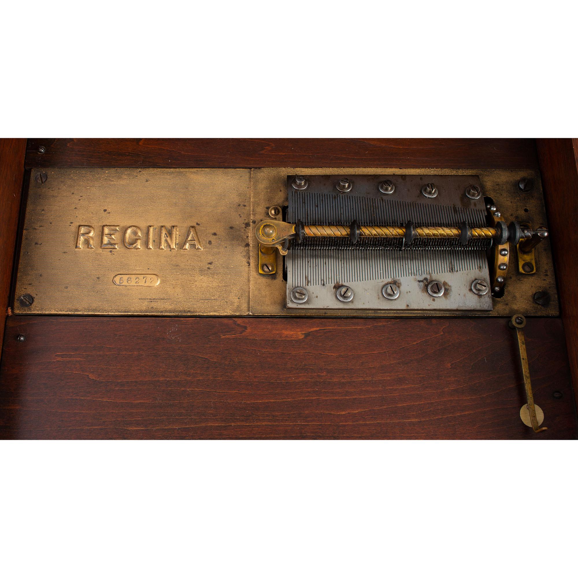 A Regina 15 1/2 Inch Disc Music Box