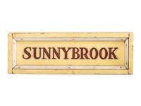 A Painted Wood Double-Sided 'Sunnybrook' Sign