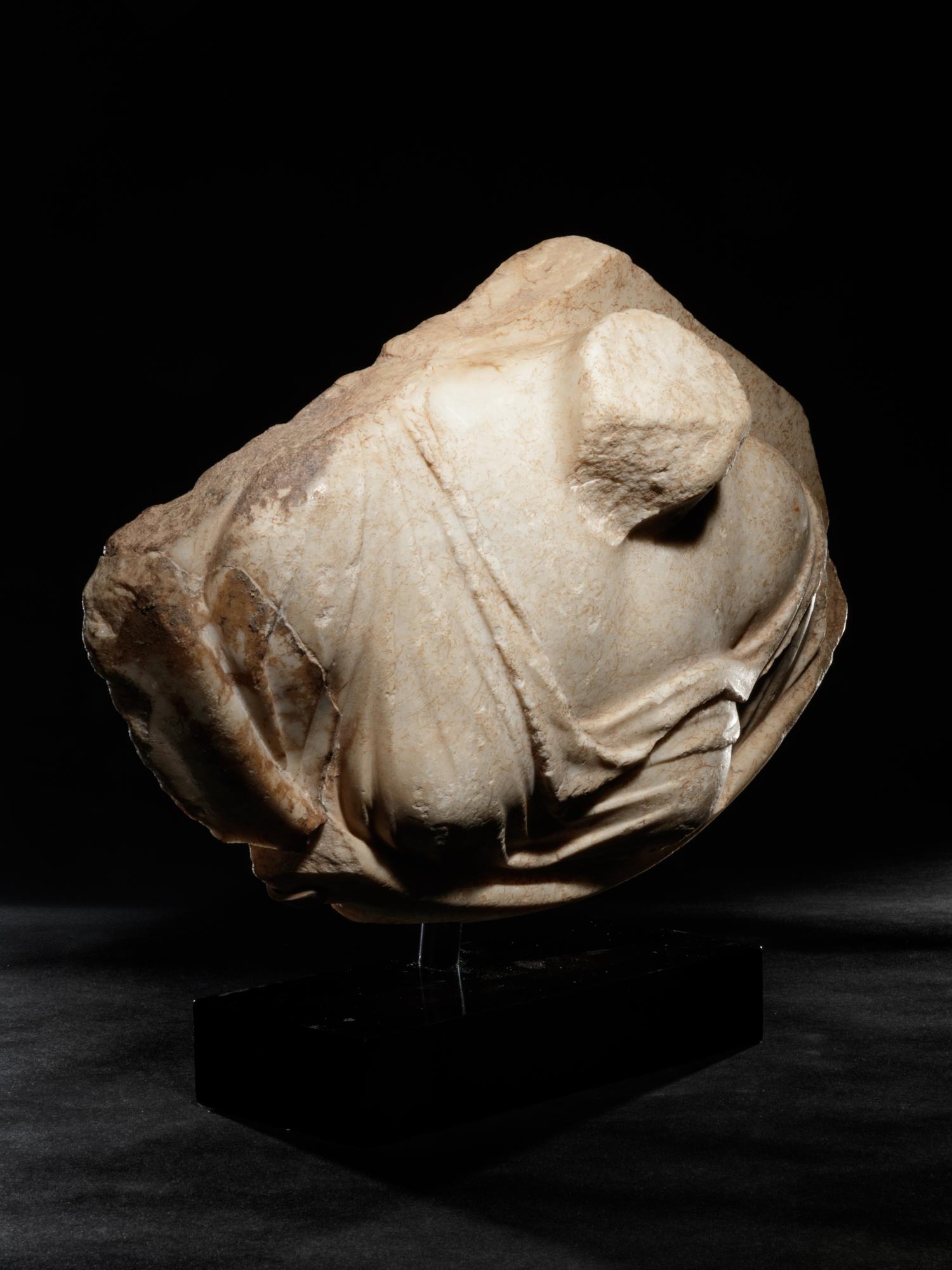 A Roman Marble Draped Aphrodite from a Roundel